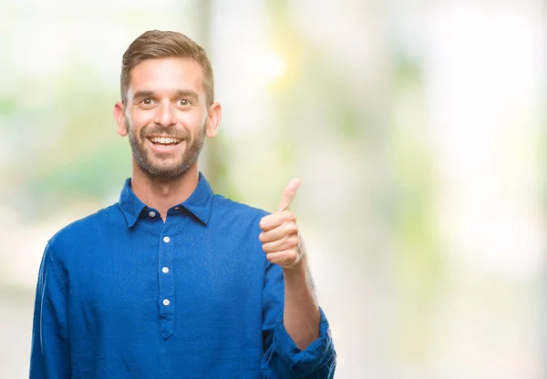 Jonge Knappe Man Geïsoleerde Achtergrond Gelukkig Duimschroef Opwaarts Gebaar Met — Stockfoto