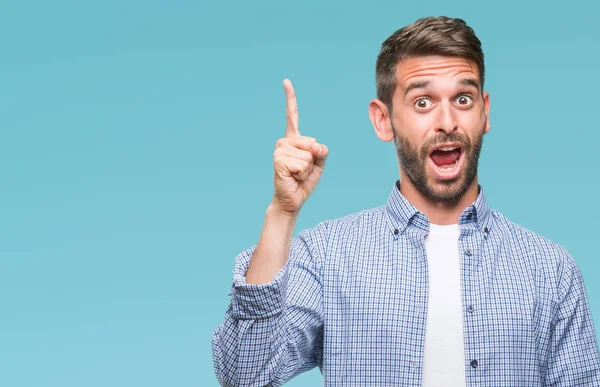 Jonge Knappe Man Dragen Witte Shirt Geïsoleerde Achtergrond Wijzende Vinger — Stockfoto