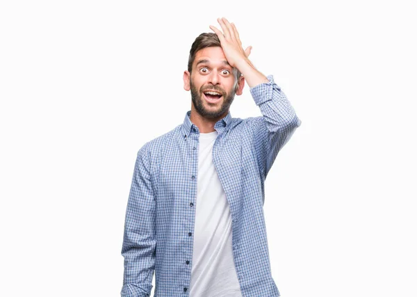 Homem Bonito Jovem Vestindo Shirt Branca Sobre Fundo Isolado Surpreendido — Fotografia de Stock