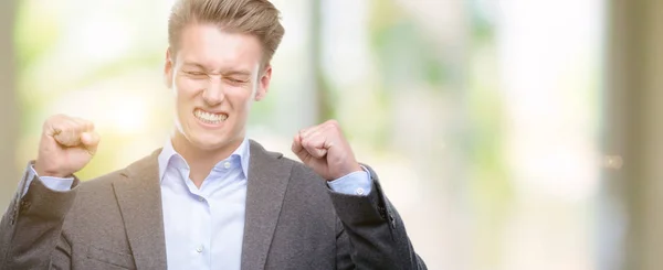 Young Handsome Blond Business Man Excited Success Arms Raised Celebrating — Stock Photo, Image