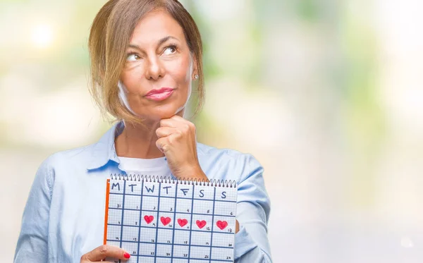 Mulher Hispânica Sênior Meia Idade Segurando Calendário Menstruação Sobre Fundo — Fotografia de Stock