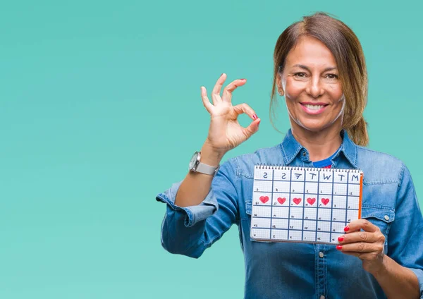 Medelåldern Senior Spansktalande Kvinna Som Håller Menstruation Kalender Över Isolerade — Stockfoto