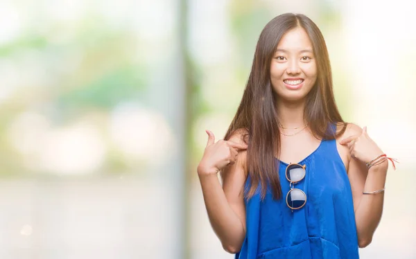 Young Asian Woman Isolated Background Looking Confident Smile Face Pointing — Stock Photo, Image