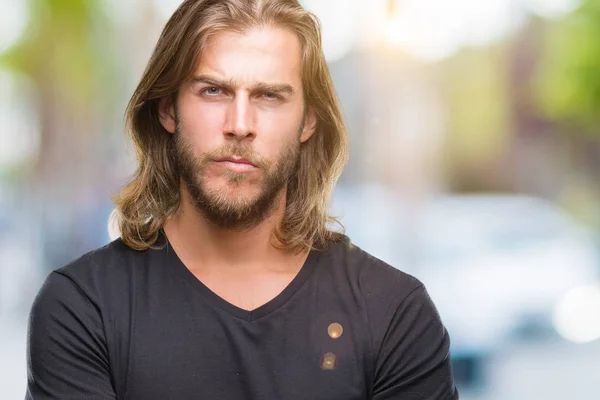 Young Handsome Man Long Hair Isolated Background Skeptic Nervous Disapproving Stock Photo