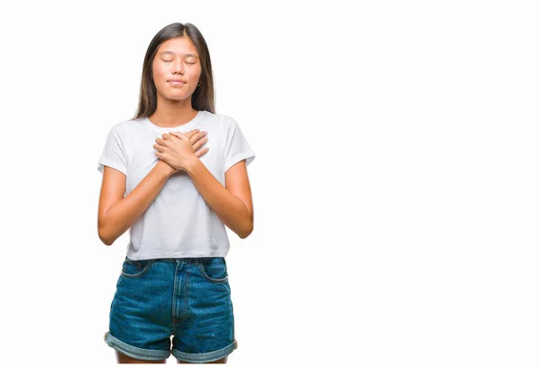 Young Asian Woman Isolated Background Smiling Hands Chest Closed Eyes — Stock Photo, Image