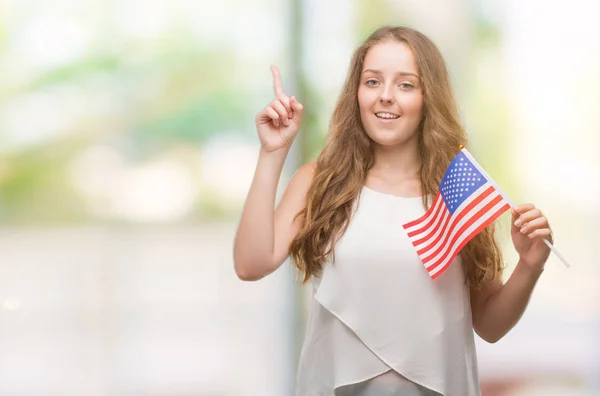 Young Blonde Woman Holding Flag Usa Surprised Idea Question Pointing — Stock Photo, Image