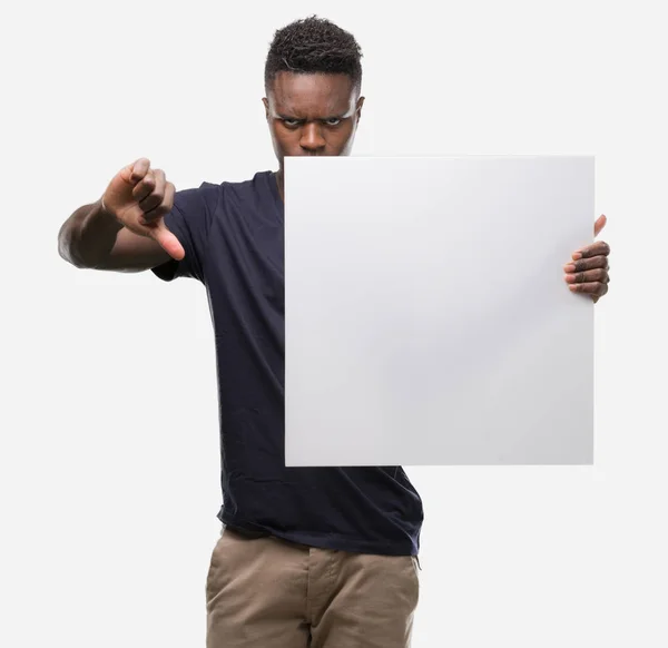 Young African American Man Holding Banner Angry Face Negative Sign — Stock Photo, Image