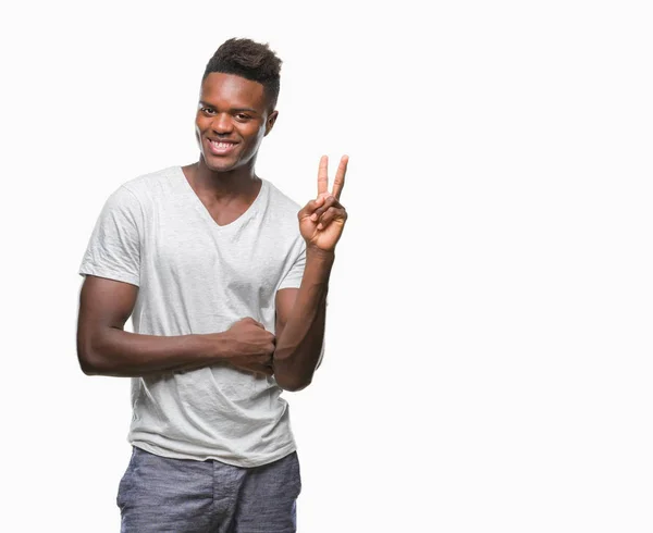 Młody Człowiek African American Białym Tle Uśmiechnięty Szczęśliwy Twarz Mrugając — Zdjęcie stockowe