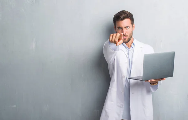 Handsome Young Man Grey Grunge Wall Wearing White Coat Using — Stock Photo, Image