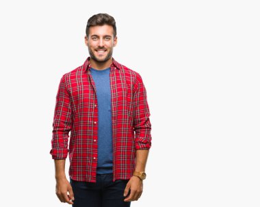 Yakışıklı delikanlı yüzünde mutlu ve güzel bir gülümseme ile izole arka plan üzerinde. Şanslı kişi.