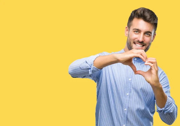 Jovem Homem Bonito Sobre Fundo Isolado Sorrindo Amor Mostrando Símbolo — Fotografia de Stock