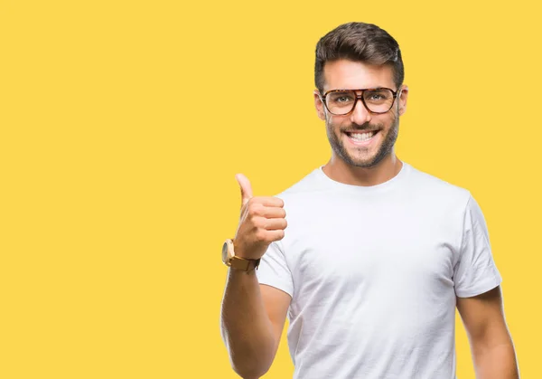 Joven Hombre Guapo Con Gafas Sobre Fondo Aislado Haciendo Gesto —  Fotos de Stock