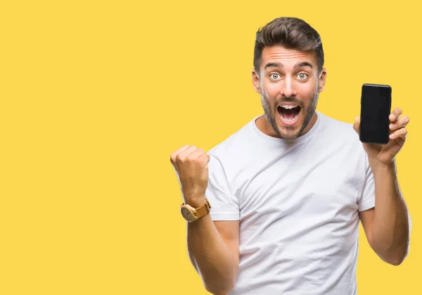 Young Handsome Man Showing Smartphone Screen Isolated Background Screaming Proud — Stock Photo, Image