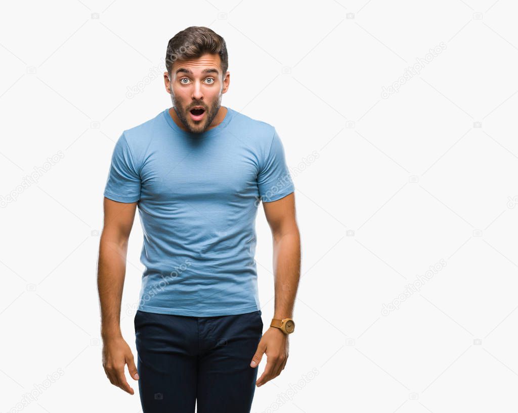 Young handsome man over isolated background afraid and shocked with surprise expression, fear and excited face.