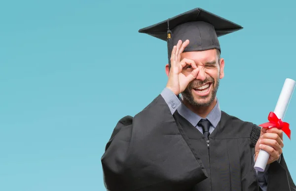 Joven Hombre Apuesto Graduado Sosteniendo Grado Sobre Fondo Aislado Con — Foto de Stock