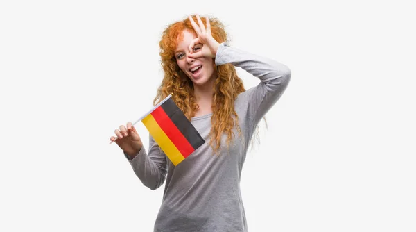 Mujer Pelirroja Joven Sosteniendo Bandera Alemania Con Cara Feliz Sonriendo —  Fotos de Stock