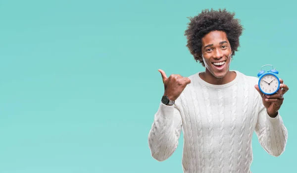 Afro American Man Holding Vintage Alarm Clock Isolated Background Pointing — Stock Photo, Image