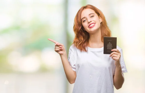 Jovem Bela Mulher Segurando Passaporte Canadá Sobre Fundo Isolado Muito — Fotografia de Stock