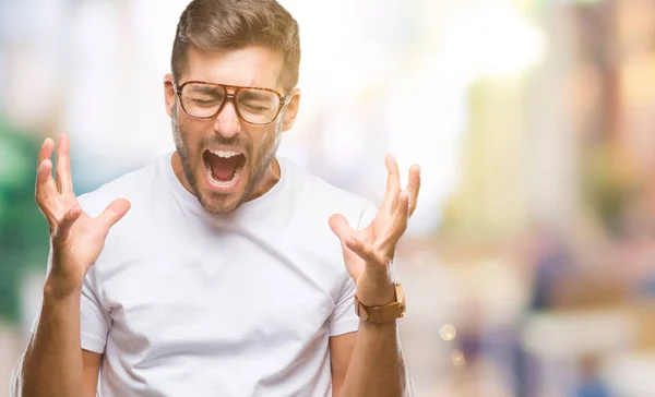 Homem Bonito Jovem Usando Óculos Sobre Fundo Isolado Celebrando Louco — Fotografia de Stock