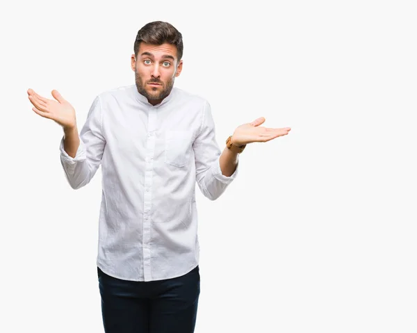 Homem Bonito Jovem Sobre Fundo Isolado Expressão Indolente Confuso Com — Fotografia de Stock