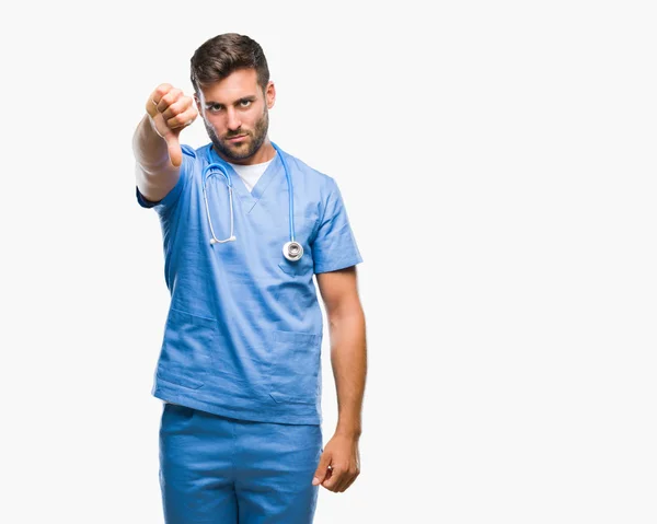 Mladý Pohledný Doktor Chirurg Muž Nad Izolované Pozadí Pohledu Nešťastný — Stock fotografie