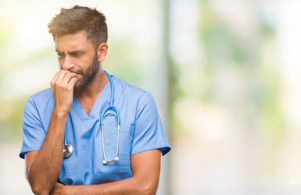 Adult Hispanic Doctor Surgeon Man Isolated Background Looking Stressed Nervous — Stock Photo, Image