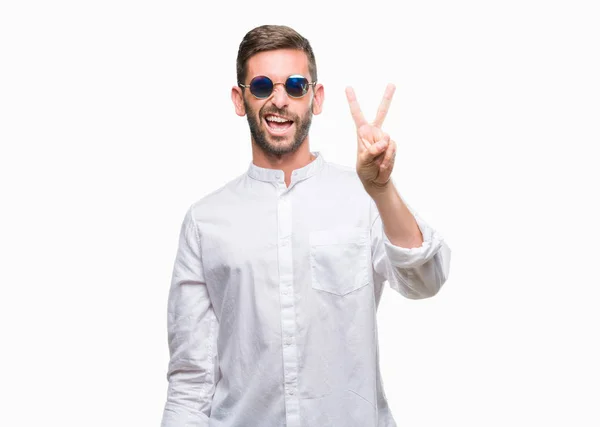 Joven Hombre Guapo Con Gafas Sobre Fondo Aislado Sonriendo Con — Foto de Stock