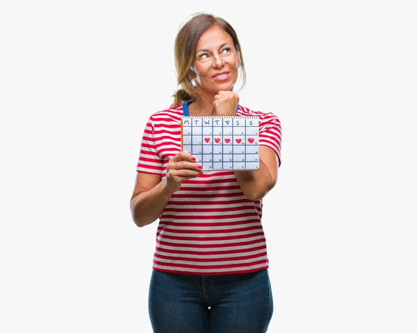 Middelbare Leeftijd Senior Spaanse Vrouw Houdt Van Menstruatie Kalender Geïsoleerd — Stockfoto