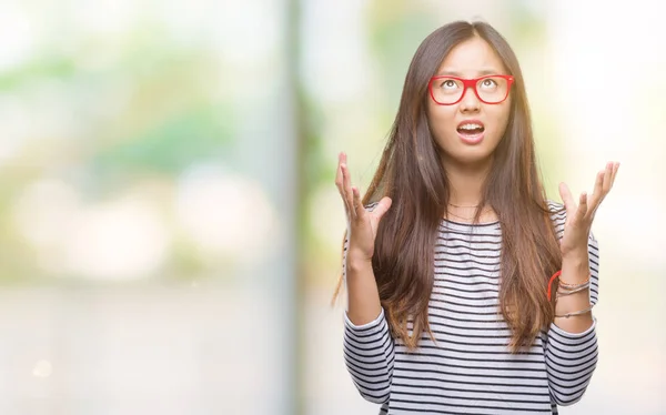 Junge Asiatische Frau Mit Brille Über Isoliertem Hintergrund Verrückt Und — Stockfoto