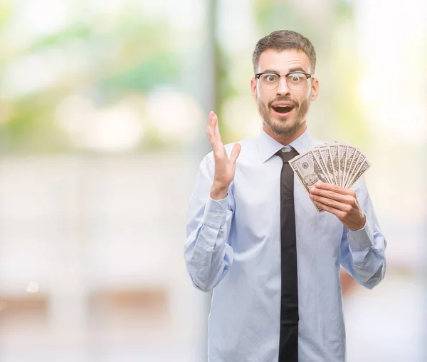 Joven Hombre Negocios Hipster Sosteniendo Dólares Muy Feliz Emocionado Expresión —  Fotos de Stock