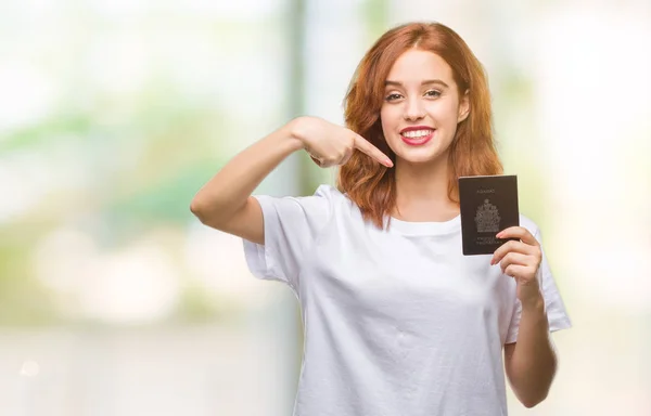 Jovem Bela Mulher Segurando Passaporte Canadá Sobre Fundo Isolado Muito — Fotografia de Stock