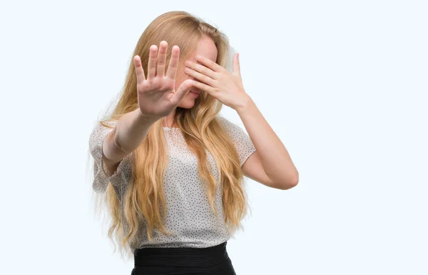 Blonde Teenager Woman Wearing Moles Shirt Covering Eyes Hands Doing — Stock Photo, Image
