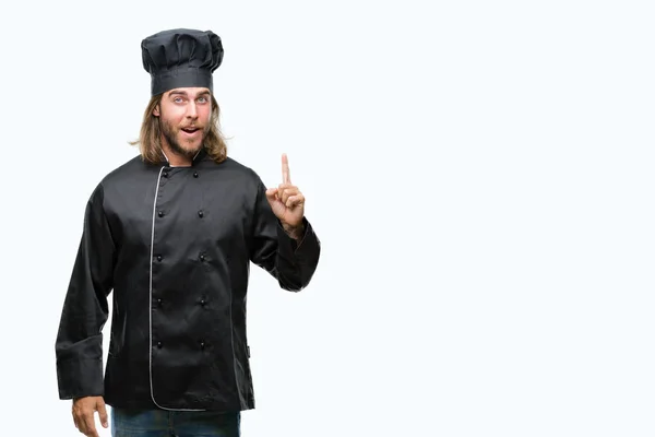 Young Handsome Cook Man Long Hair Isolated Background Pointing Finger — Stock Photo, Image