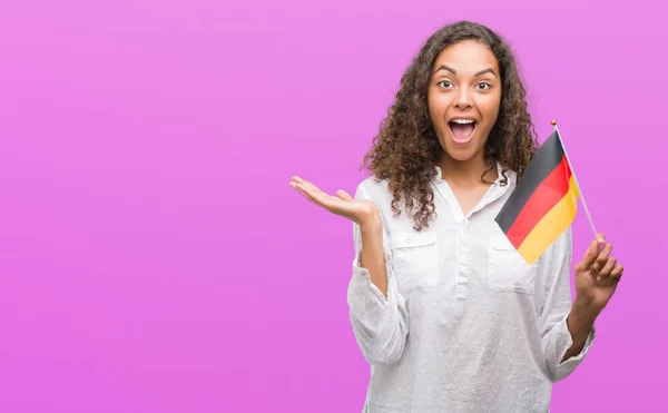 Mujer Hispana Joven Sosteniendo Bandera Alemania Muy Feliz Emocionada Expresión —  Fotos de Stock