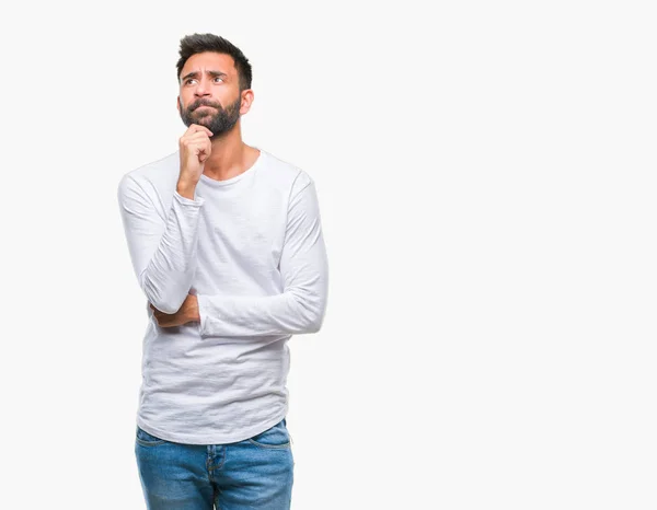 Adult Hispanic Man Isolated Background Hand Chin Thinking Question Pensive — Stock Photo, Image