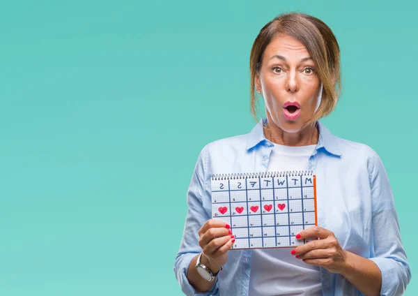 Medelåldern Senior Spansktalande Kvinna Som Håller Menstruation Kalender Över Isolerade — Stockfoto