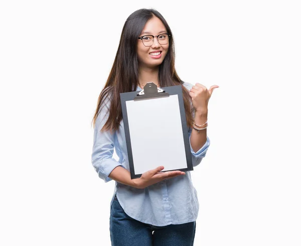 Young Asian Business Woman Holding Clipboard Isolated Background Pointing Showing — Stock Photo, Image