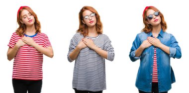 Kolaj üzerinde izole arka plan ile gülümseyen genç güzel kızıl saçlı kadının göğüs kapalı gözler ve yüzünde minnettar jest ile eller. Sağlık kavramı.