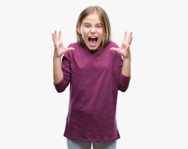 Genç güzel kız yüzünden kızgın ve silah ile başarı için deli kutluyor izole arka plan ortaya çıkar ve heyecanlı çığlık gözler kapalı. Kazanan kavramı