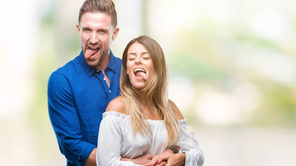 Junges Verliebtes Paar Über Isoliertem Hintergrund Das Die Zunge Glücklich — Stockfoto