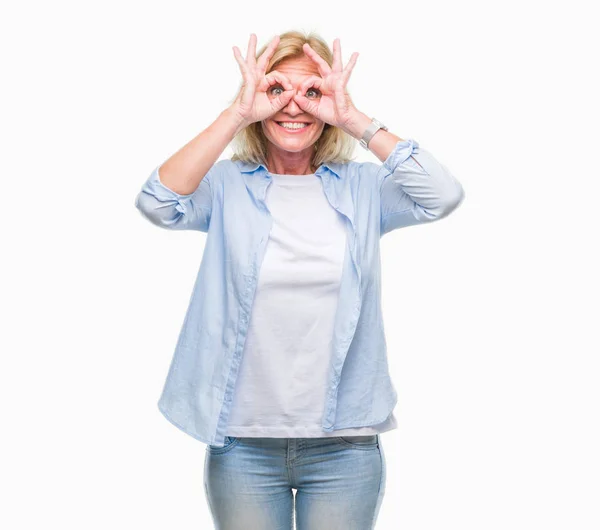 Middle Age Blonde Woman Isolated Background Doing Gesture Binoculars Sticking — Stock Photo, Image