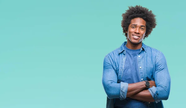 Afro american man over isolated background happy face smiling with crossed arms looking at the camera. Positive person.