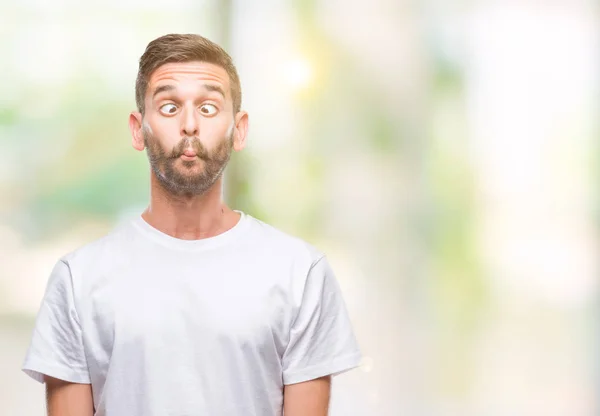 Junger Gutaussehender Mann Mit Isoliertem Hintergrund Der Fischgesicht Mit Lippen — Stockfoto