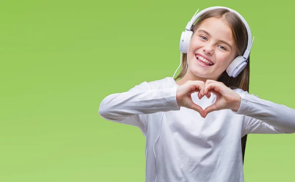Giovane Bella Ragazza Indossa Cuffie Ascoltare Musica Sfondo Isolato Sorridente — Foto Stock