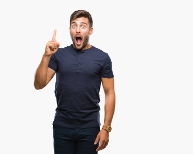 Yakışıklı delikanlı ile başarılı fikir parmağı yukarıyı izole arka plan üzerinde. Çıktıktan ve mutlu. Bir numara.