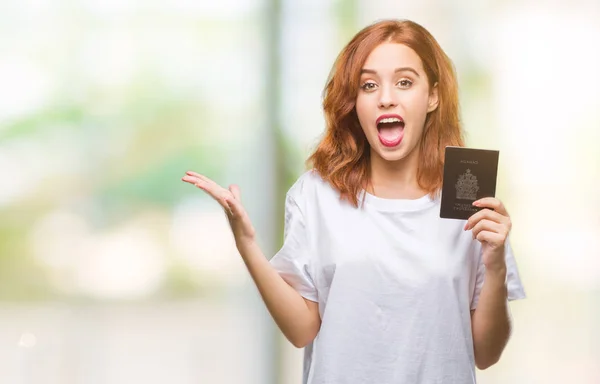 Jovem Bela Mulher Segurando Passaporte Canadá Sobre Fundo Isolado Muito — Fotografia de Stock