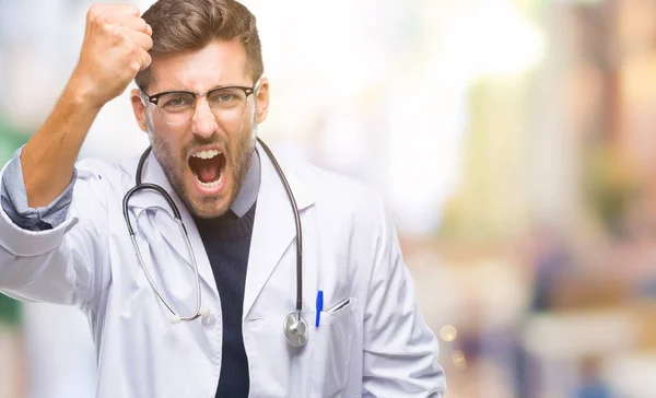 Young Handsome Doctor Man Isolated Background Angry Mad Raising Fist — Stock Photo, Image