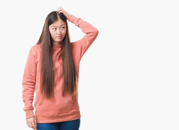 Jovem Chinesa Sobre Fundo Isolado Vestindo Camisola Esporte Confundir Perguntar — Fotografia de Stock