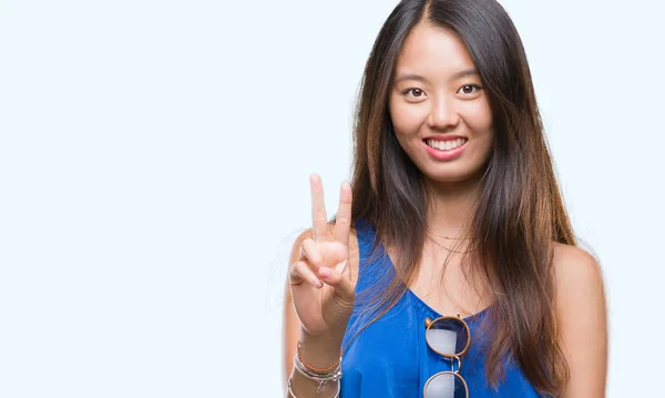 Young Asian Woman Isolated Background Showing Pointing Fingers Number Two — Stock Photo, Image