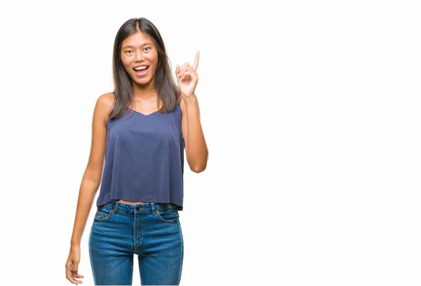 Joven Asiática Mujer Sobre Aislado Fondo Apuntando Dedo Hacia Arriba —  Fotos de Stock